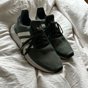 Green adidas sneakers